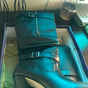 Women’s black medium heel boots size 9.